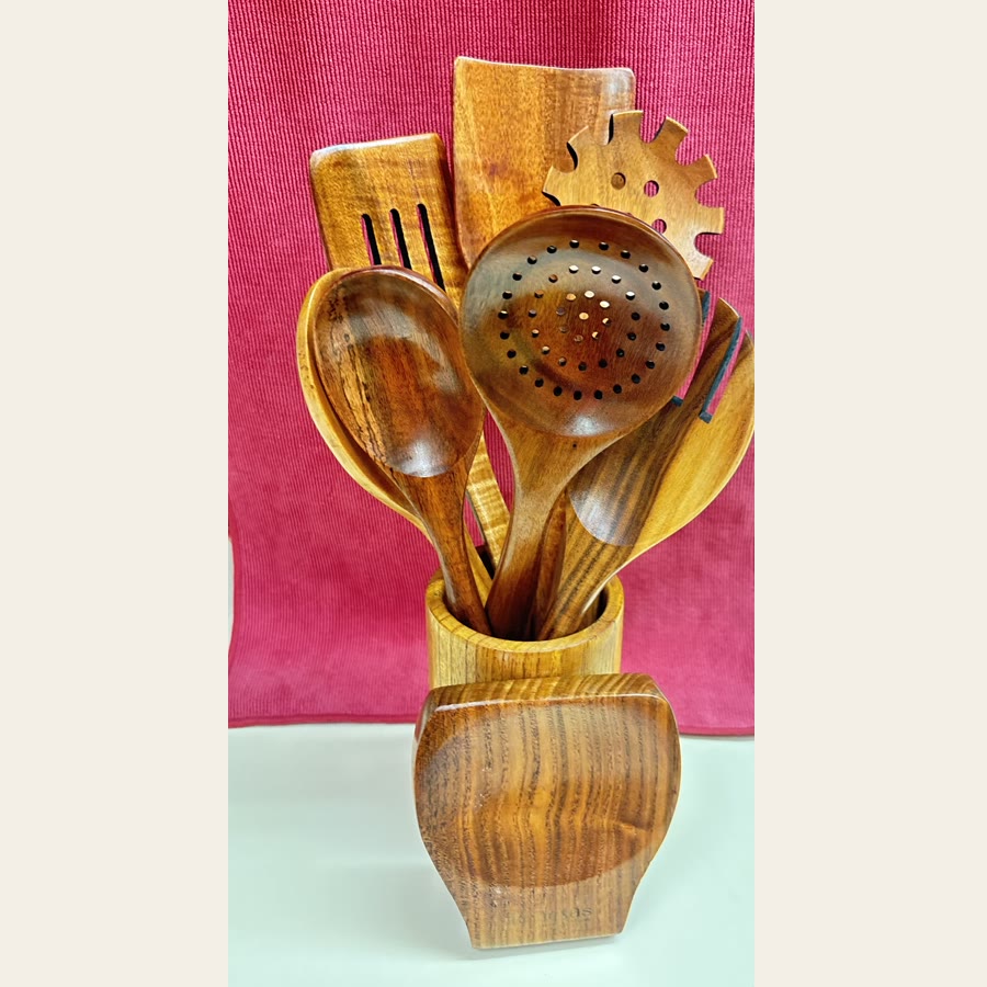 Colleen's Acacia wood spoons, ladles, and turners in a wooden holder