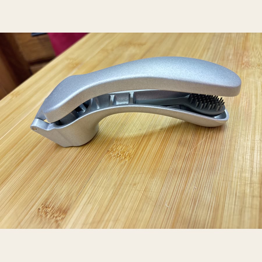 Colleen's handheld garlic press