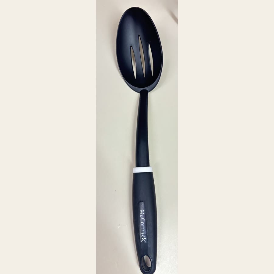 Colleen's black slotted serving spoon